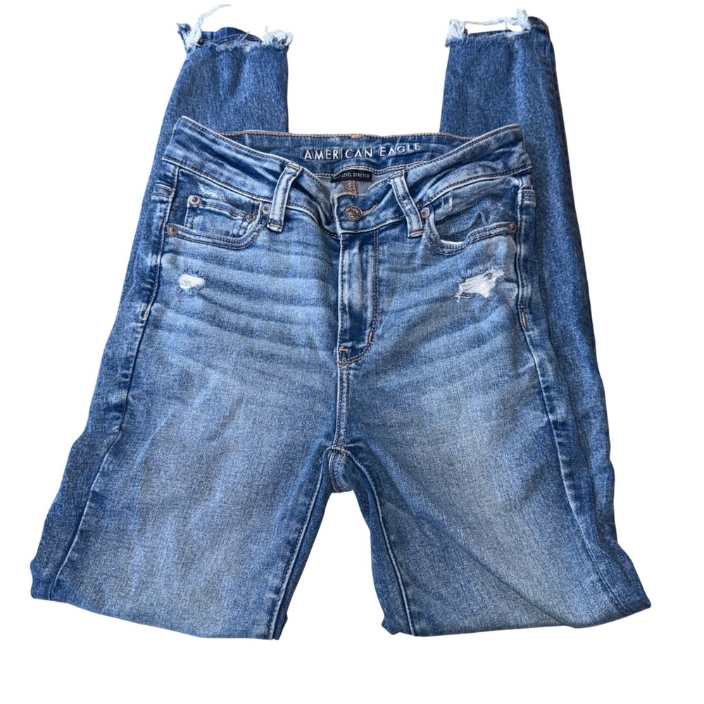 American Eagle Hi-Rise Jegging 0 Medium Wash Distressed Raw Hem Next Stretch